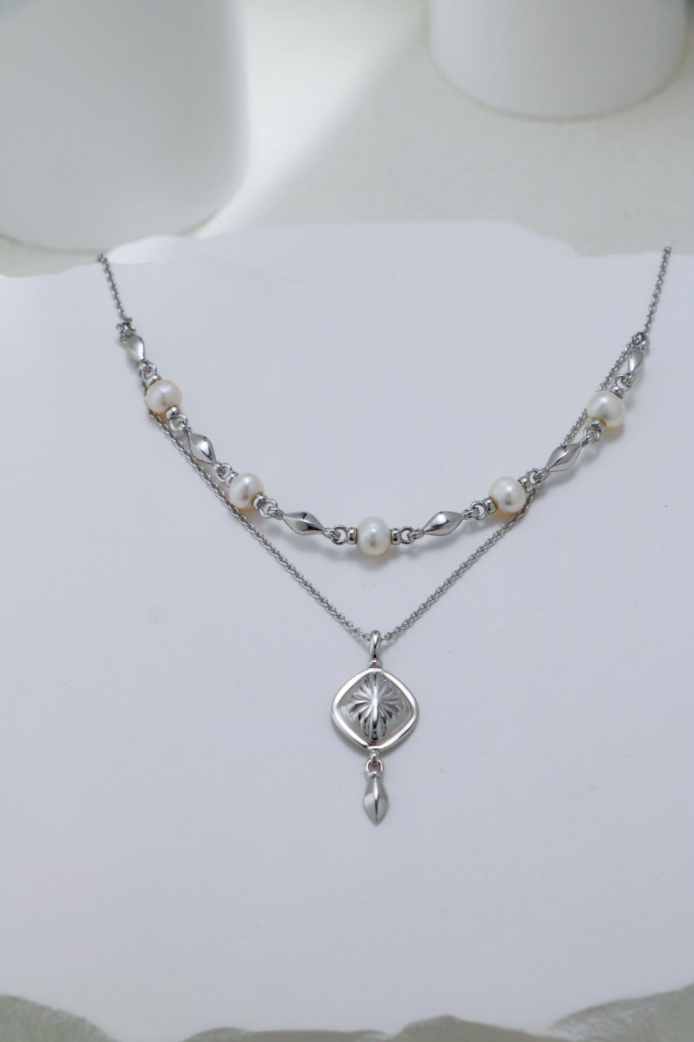 Double-layered gold pearl necklace with 925 sterling silver and freshwater pearls
Delicate gold vermeil pearl necklace – Celestial Bloom by Petite Secret
Elegant pearl necklace for layering – Petite Secret Jewellery.