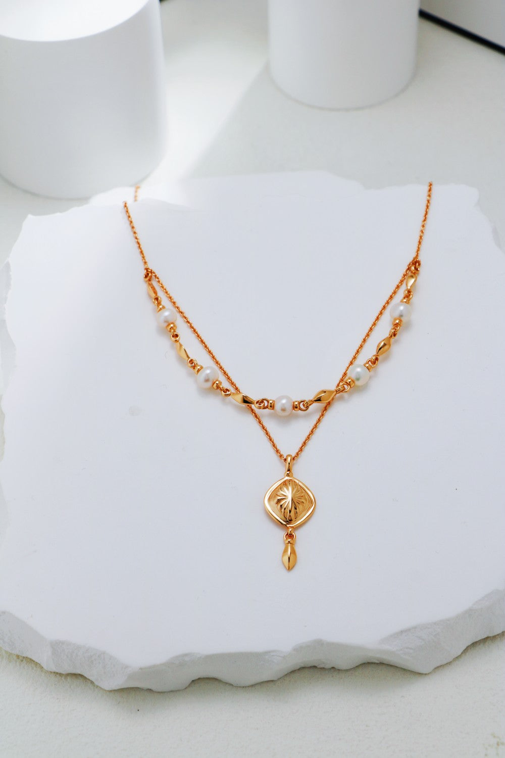 Double-layered gold pearl necklace with 925 sterling silver and freshwater pearls
Delicate gold vermeil pearl necklace – Celestial Bloom by Petite Secret
Elegant pearl necklace for layering – Petite Secret Jewellery.